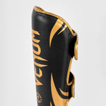 Caneleiras Venum Challenger Preto-ouro 