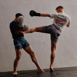 T-shirt Manto Nothing Personal Branco-Combat Arena